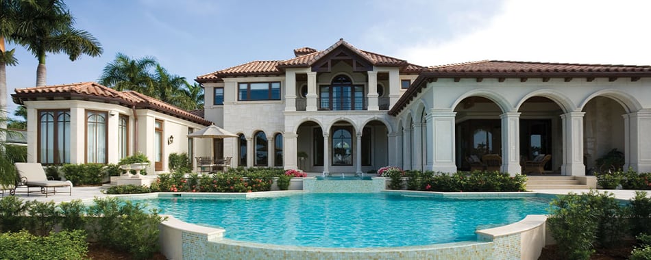Florida mansion with pool and palm trees