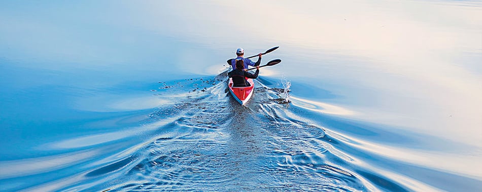 Kayak in still water paddling two people 